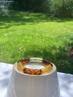 Bracelet de perles or, léopard et paillettes dorées